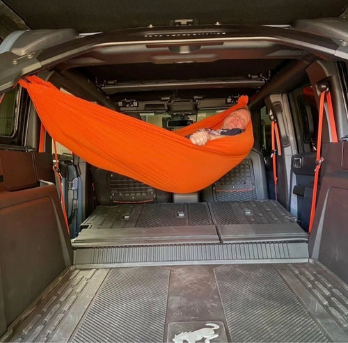 Meraki solo hammock installed inside a Ford Bronco Raptor with no-drill roll bar brackets - photo 1