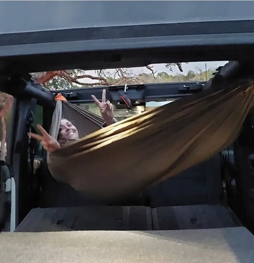 Meraki solo hammock installed inside a Gen 6 Ford Bronco 4-Door with no-drill roll bar brackets - photo 2